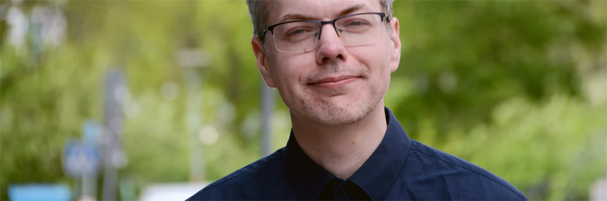 A man smiling for the camera
