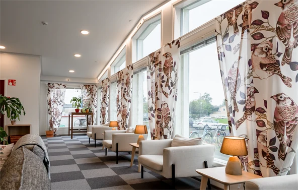 Room with white chairs