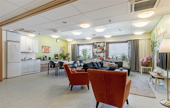 Room with a kitchen and chairs